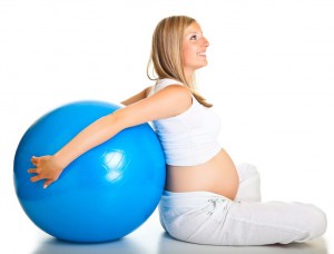 Pregnant woman with exercise ball